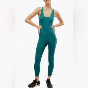 Free People Dark Green Athletic Movement Back It Up Jumpsuit size small NWT
